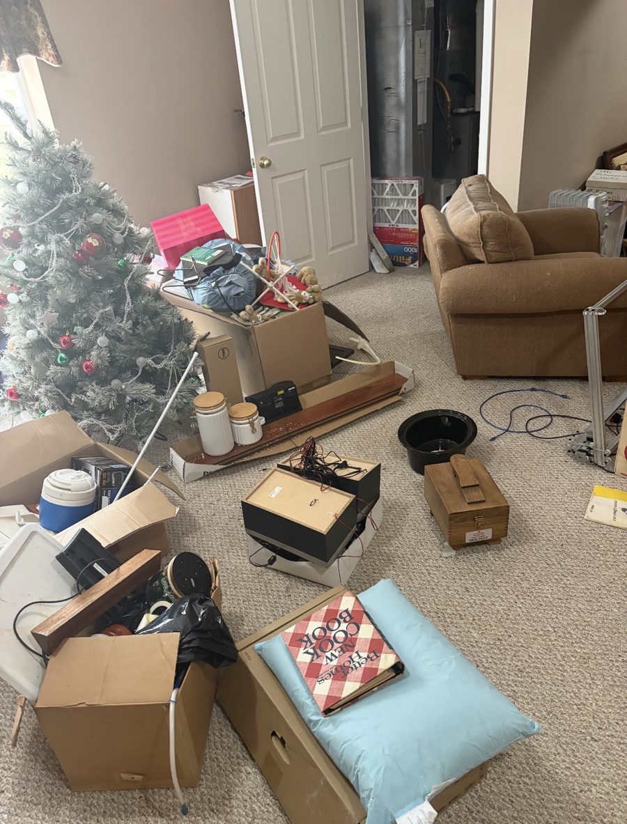 Before: cluttered room full of boxes